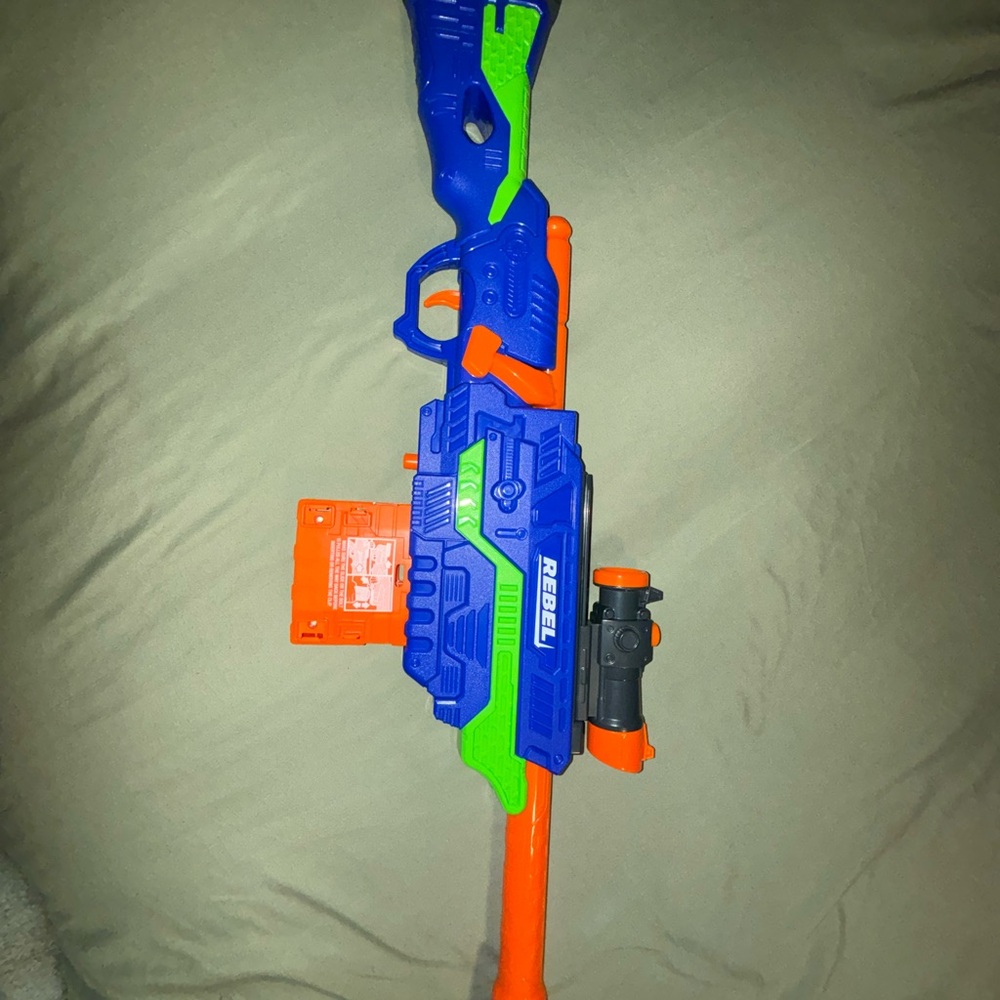 Rebels Vibrant Blue and Orange nerf gun. Foam bullets not included